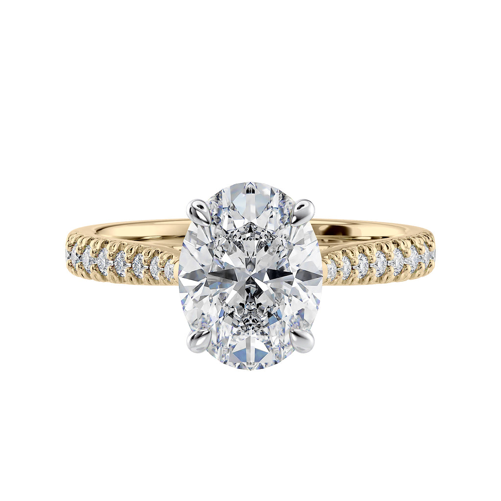 Natural oval cut engagement ring with tapered diamond gold band front view.