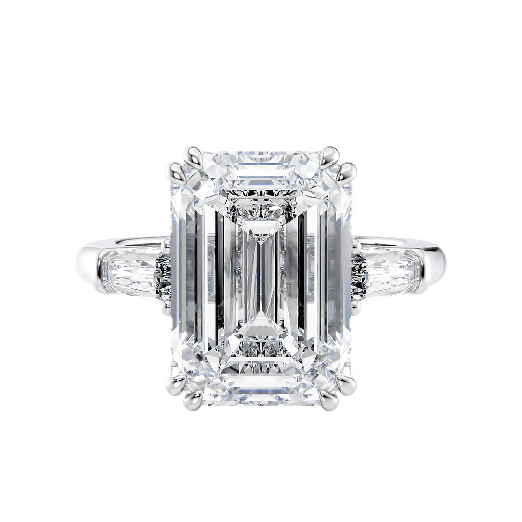 Emerald cut laboratory grown diamond engagement ring with tapered baguette shoulders white gold front view.