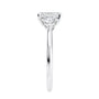 Emerald cut natural diamond 3 stone engagement ring white gold end view.