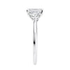 Emerald cut natural diamond 3 stone engagement ring white gold end view.