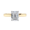 Lab grown emerald cut diamond solitaire engagement ring 18ct gold front view.