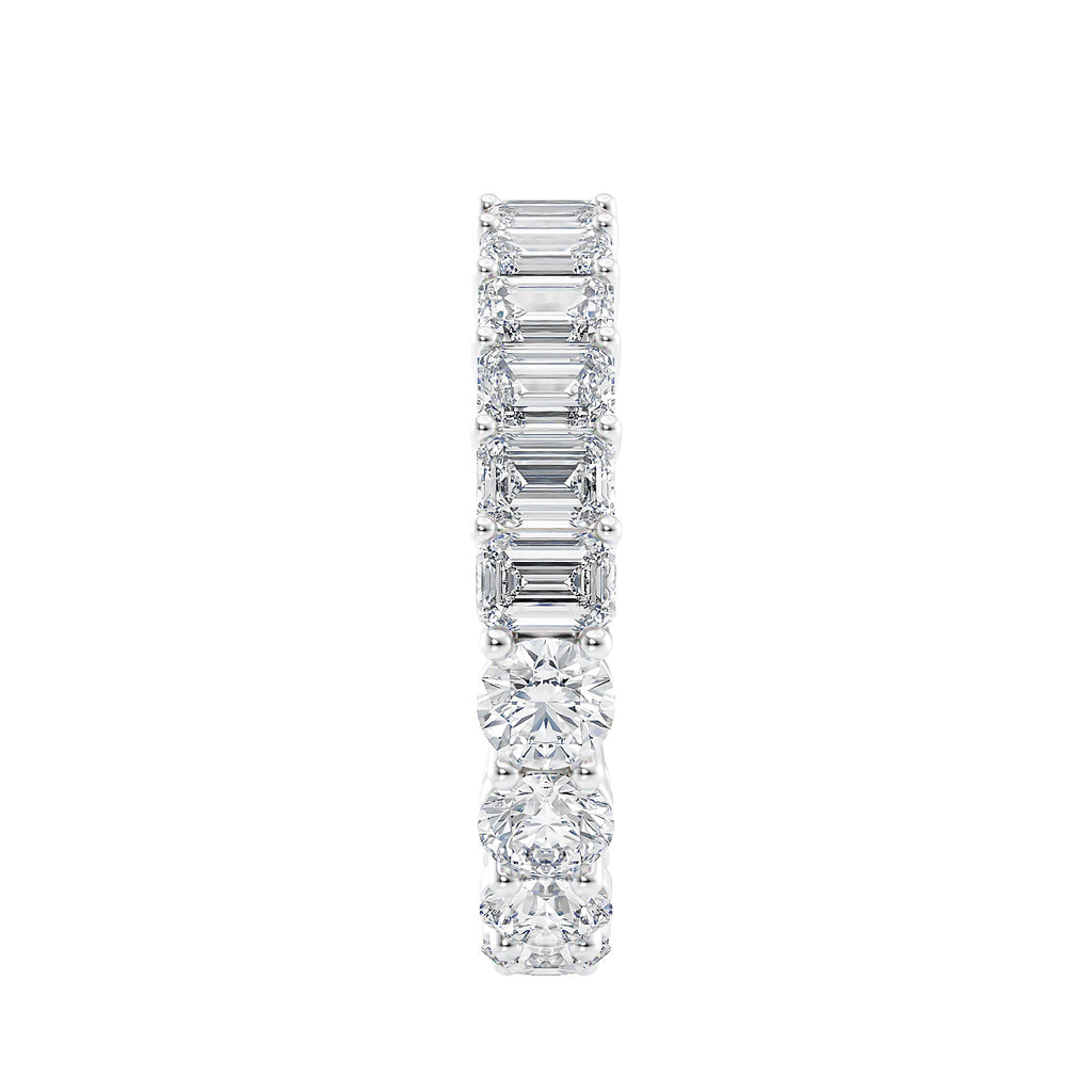 Platinum fusion round and emerald cut diamond eternity ring end view.