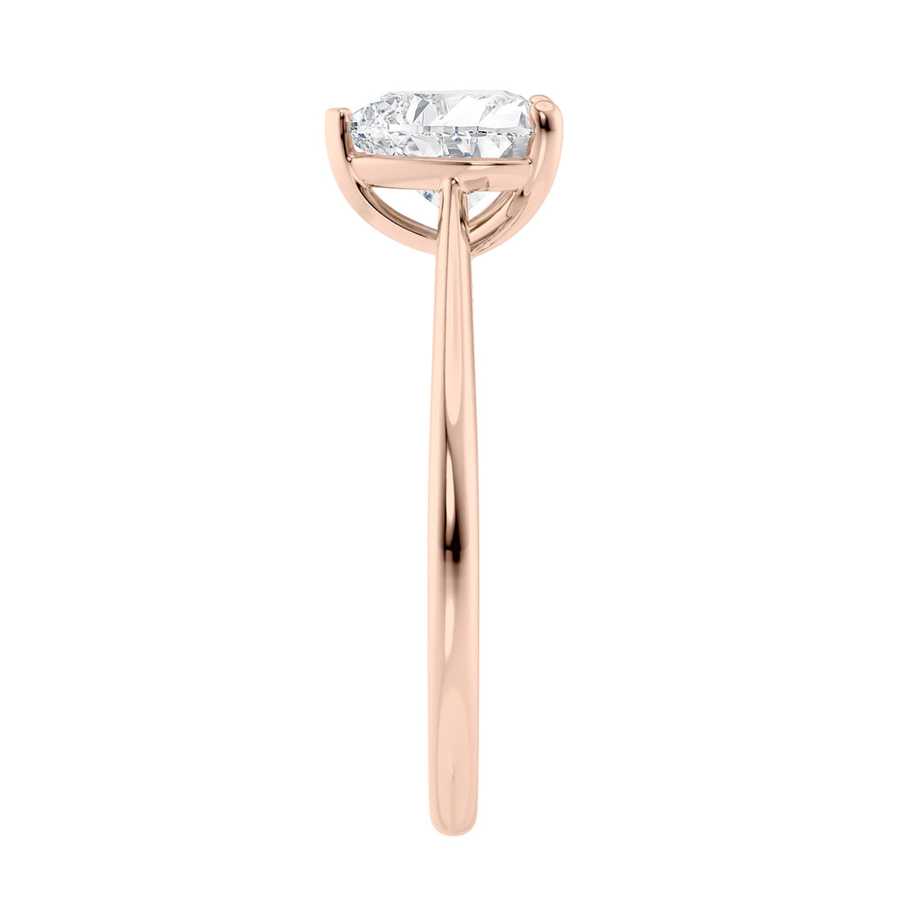 Laboratory grown heart cut diamond solitaire engagement ring with diamond set bridge 18ct rose gold end view.