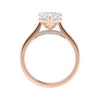 Laboratory grown heart cut diamond solitaire engagement ring with diamond set bridge 18ct rose gold side view.