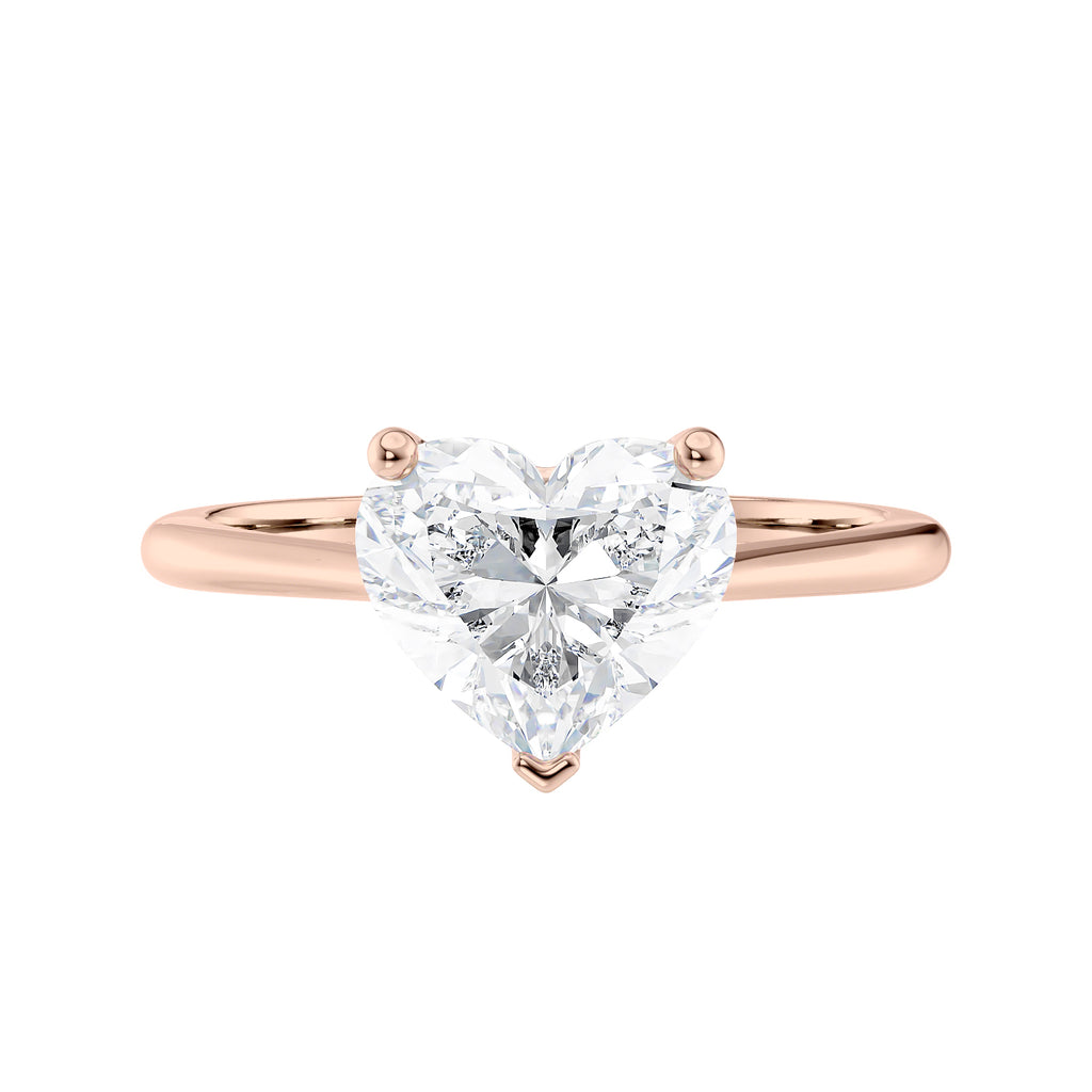 Laboratory grown heart cut diamond solitaire engagement ring with diamond set bridge 18ct rose gold front view.