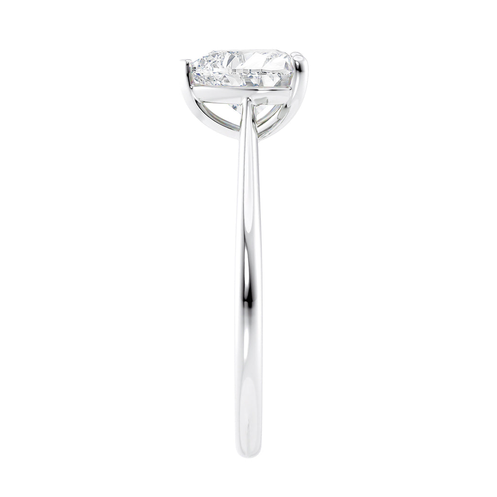 Laboratory grown heart cut diamond solitaire engagement ring with diamond set bridge white gold end  view.