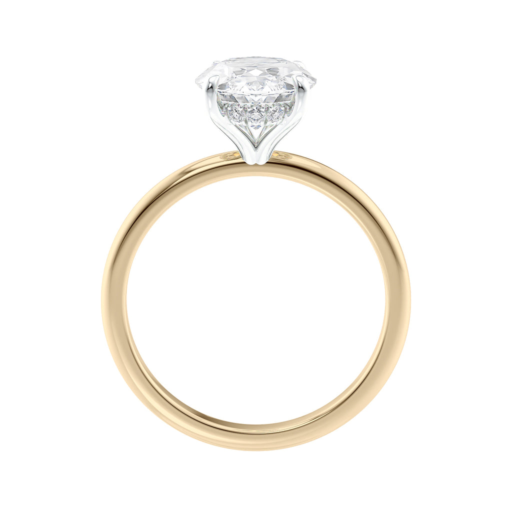 Hidden halo oval lab grown diamond engagement ring slim band gold side view.