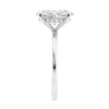 Hidden halo oval lab grown diamond engagement ring slim band white gold end view.