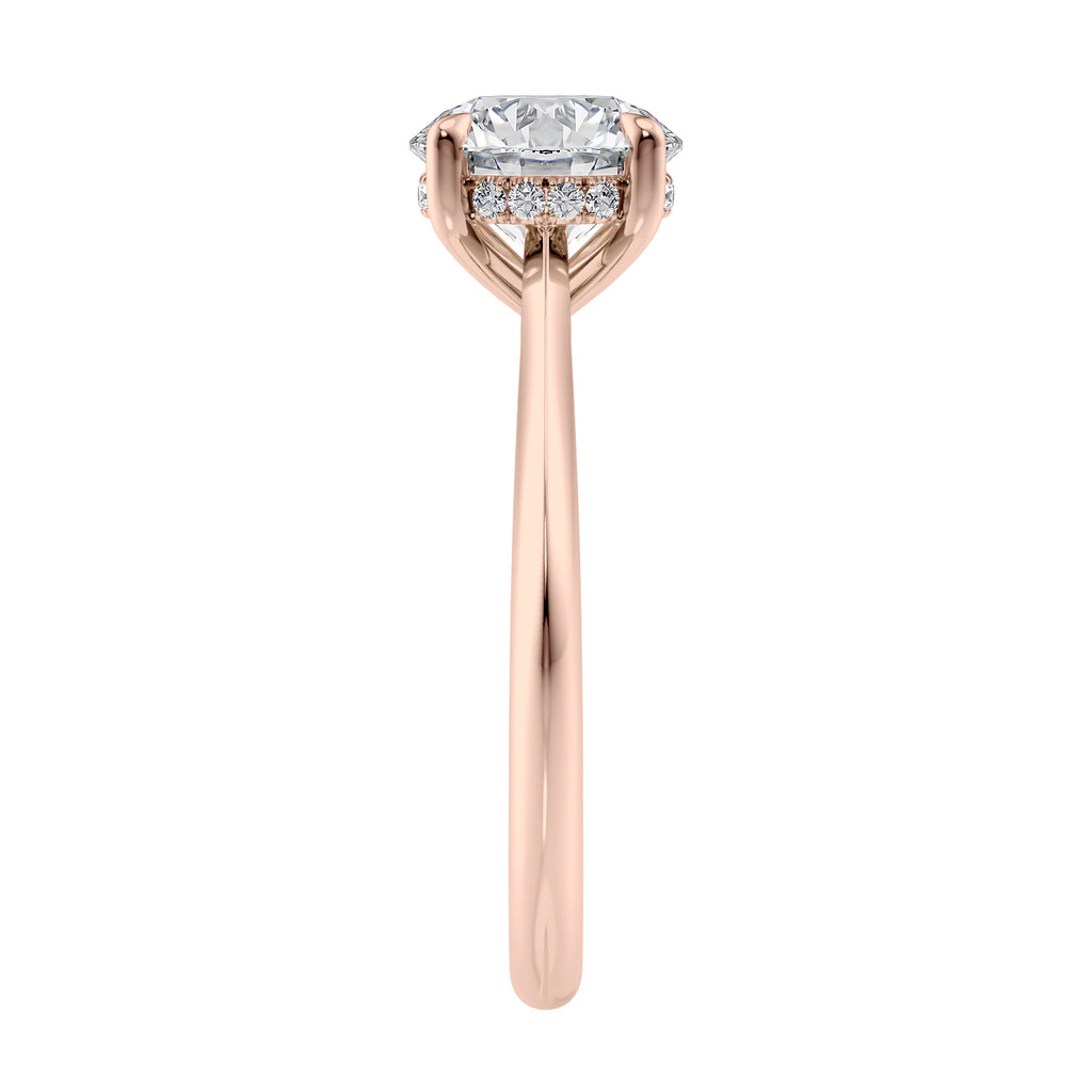 Natural diamond solitaire with a hidden halo 18 carat rose gold end view.
