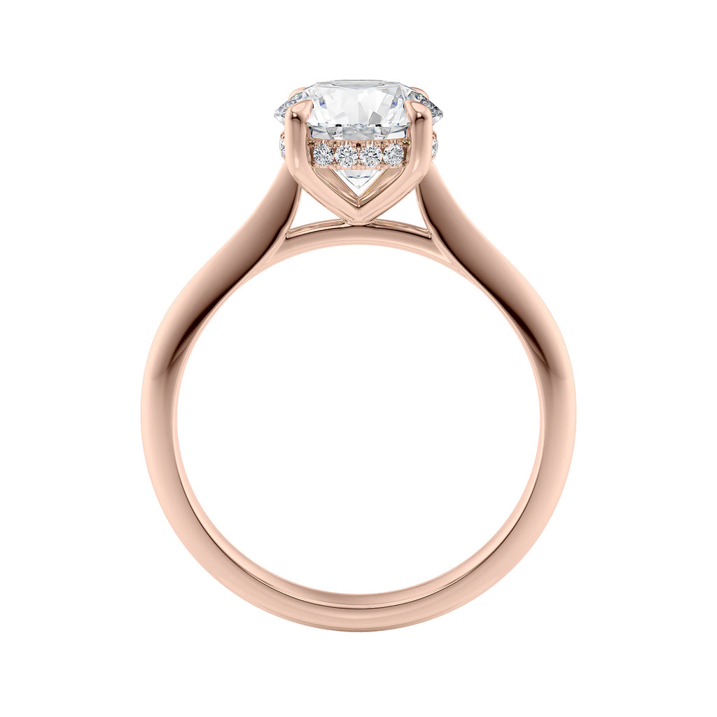 Natural diamond solitaire with a hidden halo 18 carat rose gold side view.