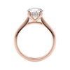 Natural diamond solitaire with a hidden halo 18 carat rose gold side view.
