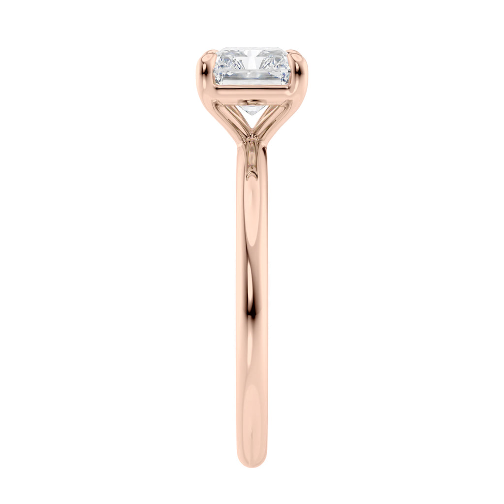Radiant cut lab grown diamond east-west set on thin band rose gold end view.