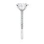 Laboratory grown diamond oval solitaire engagement ring with slim diamond band white gold end view.