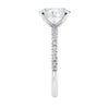 Laboratory grown diamond oval solitaire engagement ring with slim diamond band white gold end view.