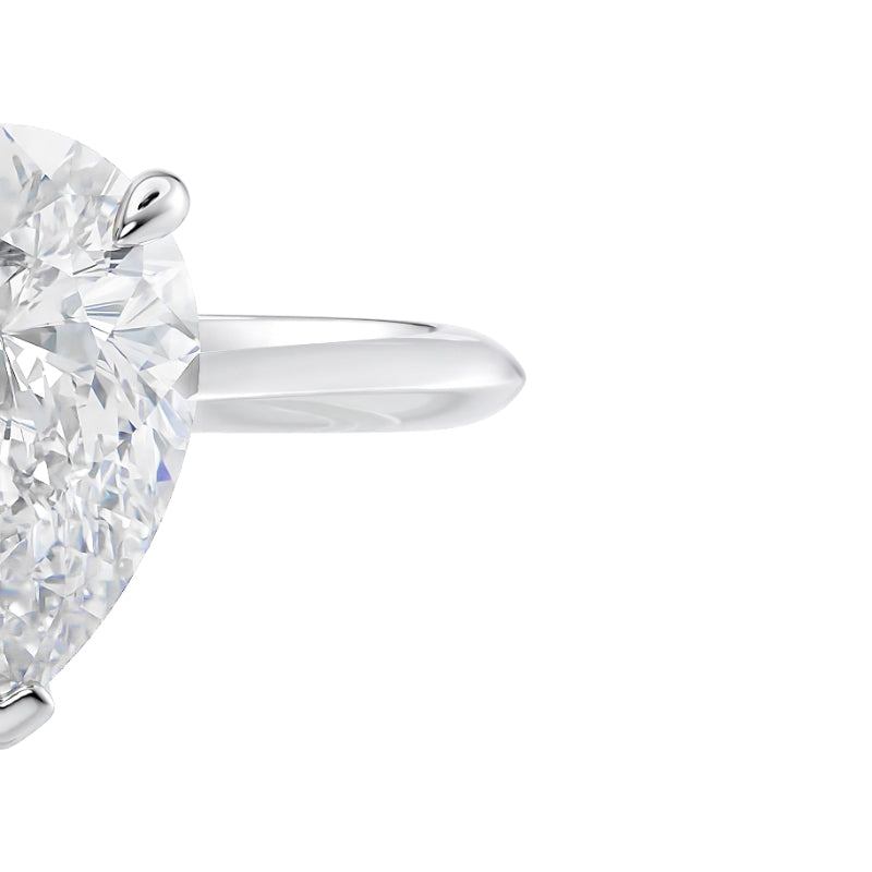 Pear cut diamond engagement ring. McGuire Diamonds