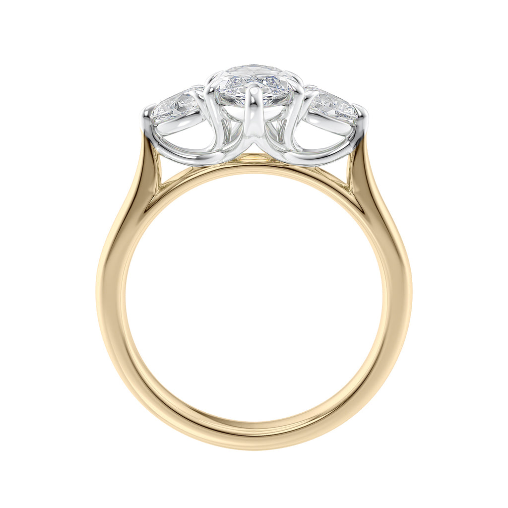 Marquise cut diamond with pear cut diamond shoulders 3 stone engagement ring gold side view.