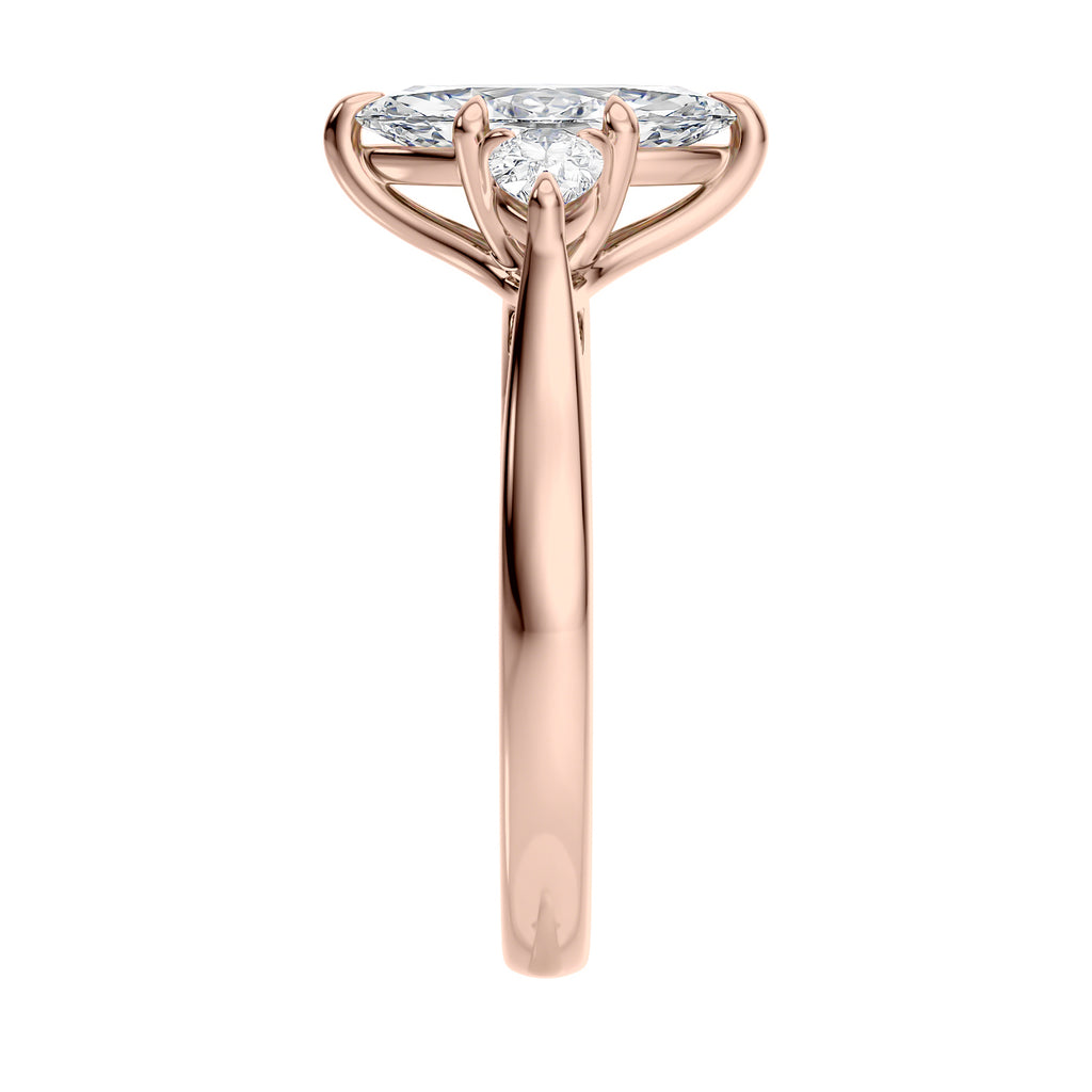 Marquise cut diamond with pear cut diamond shoulders 3 stone engagement ring rose gold end view.