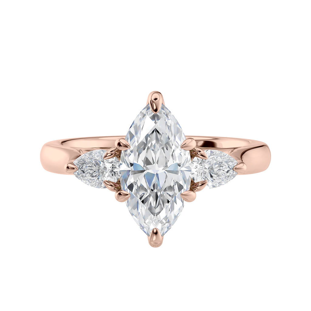 Marquise cut diamond with pear cut diamond shoulders 3 stone engagement ring rose gold front view.