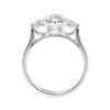 Marquise cut diamond with pear cut diamond shoulders 3 stone engagement ring white gold side view.
