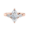 Lab grown marquise cut trilogy diamond engagement ring 18ct rose gold front view.
