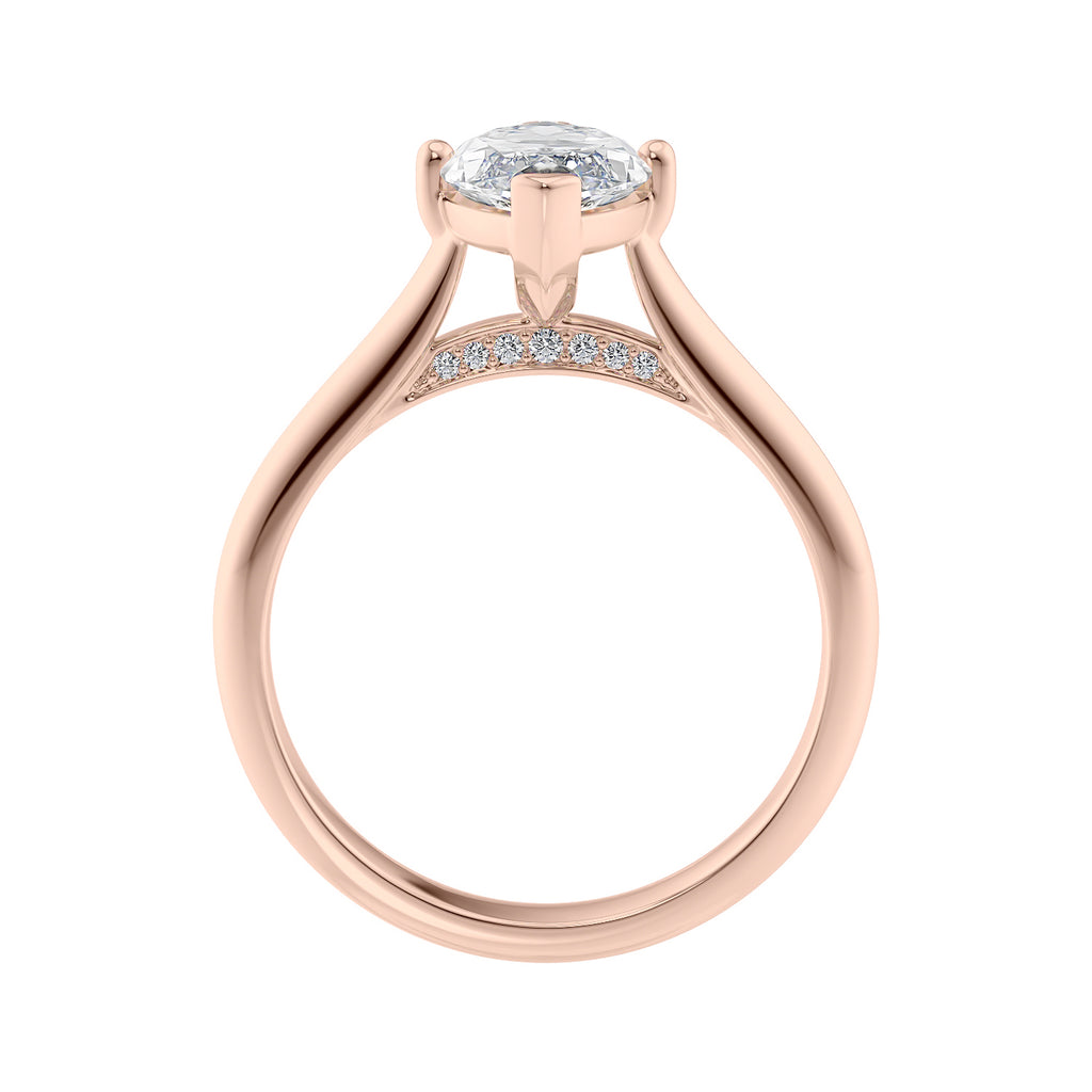 Lab grown diamond marquise cut solitaire engagement ring with diamond bridge 18ct rose gold side view.