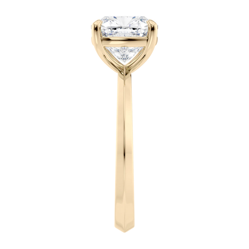 Natural cushion cut diamond solitaire engagement ring gold end view.