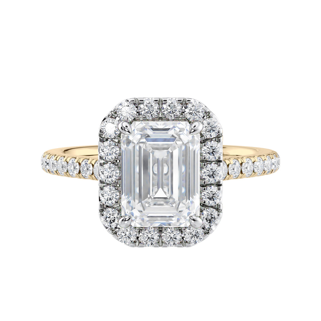 Natural diamond emerald cut halo style engagement ring 18ct gold front view.
