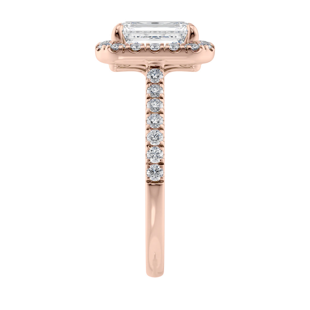 Natural diamond emerald cut halo style engagement ring 18ct rose gold end view.