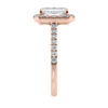 Natural diamond emerald cut halo style engagement ring 18ct rose gold end view.