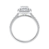 Natural diamond emerald cut halo style engagement ring white gold side view.