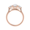 Oval 3 stone diamond engagement ring with pear side stones 18ct rose gold side view.