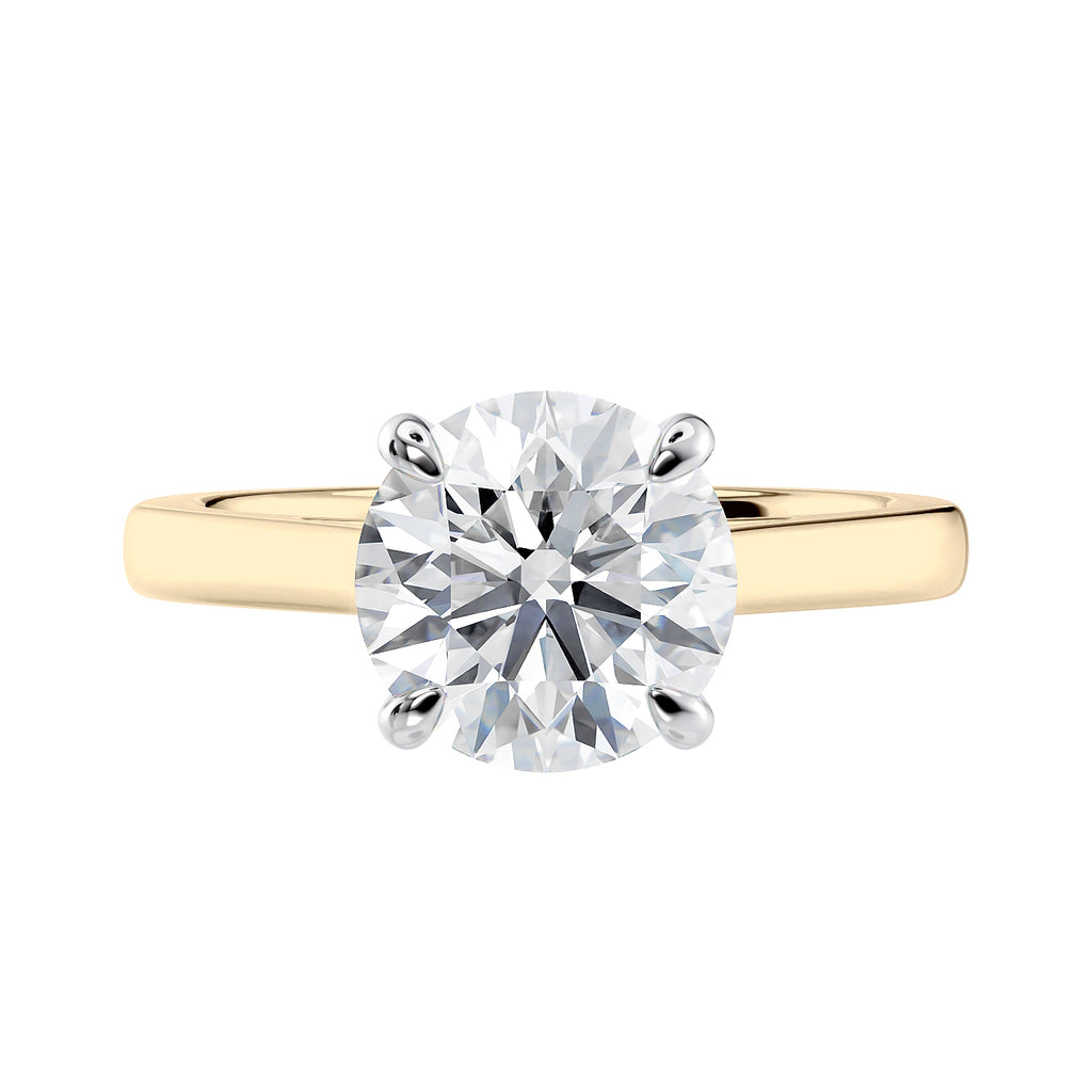 Traditional round natural diamond engagement ring in gold front view.
