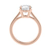 Traditional round natural diamond engagement ring in rose gold side view.
