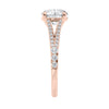 Round brilliant cut diamond engagement ring with diamond set split band rose gold end view.