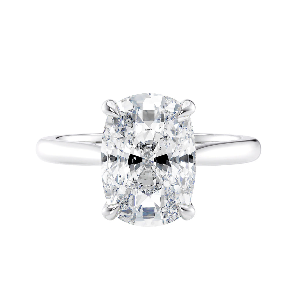 Elongated cushion cut solitaire diamond engagement ring front view.