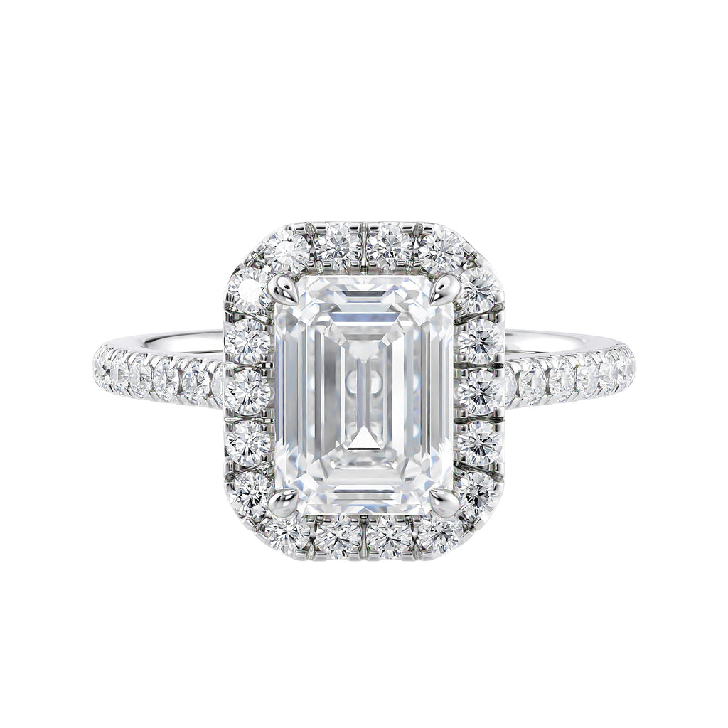 Natural diamond emerald cut halo style engagement ring white gold front view.