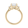 3 stone princess cut diamond engagement ring in gold side view.