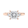 3 stone princess cut diamond engagement ring in rose gold front view.
