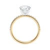Solitaire diamond engagement ring with diamond band 18ct gold side view.
