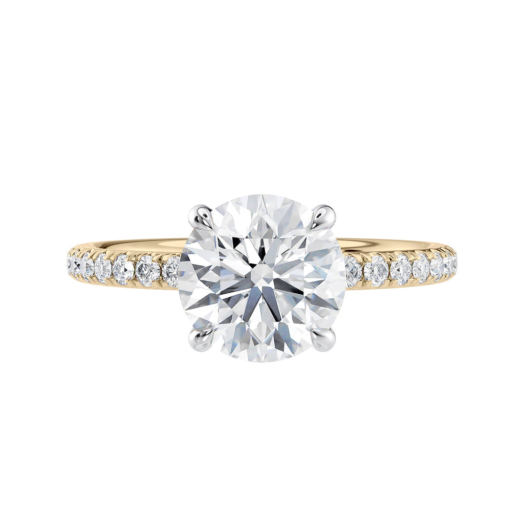Solitaire diamond engagement ring with diamond band 18ct gold front view.