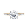 Solitaire diamond engagement ring with diamond band 18ct gold front view.