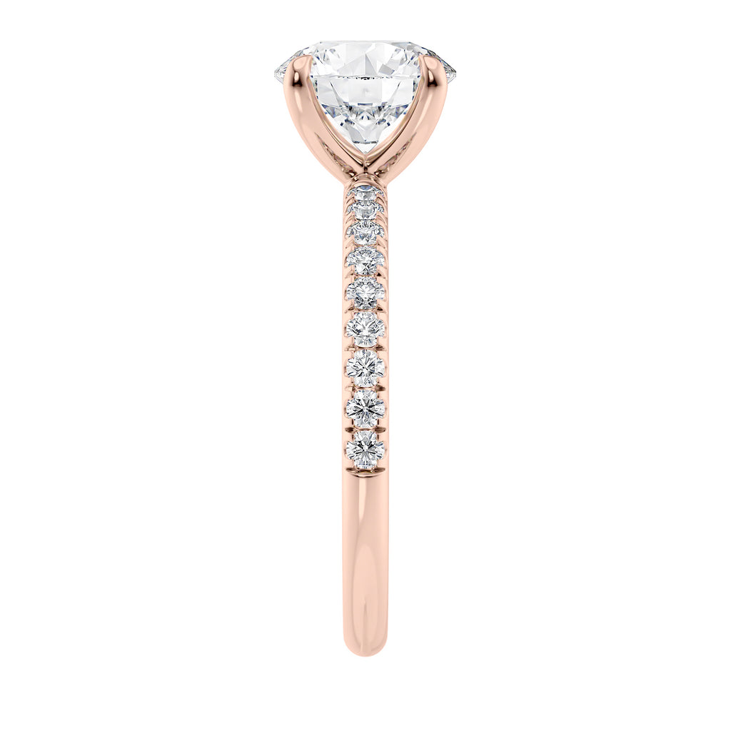 Solitaire diamond engagement ring with diamond band 18ct rose gold end view.