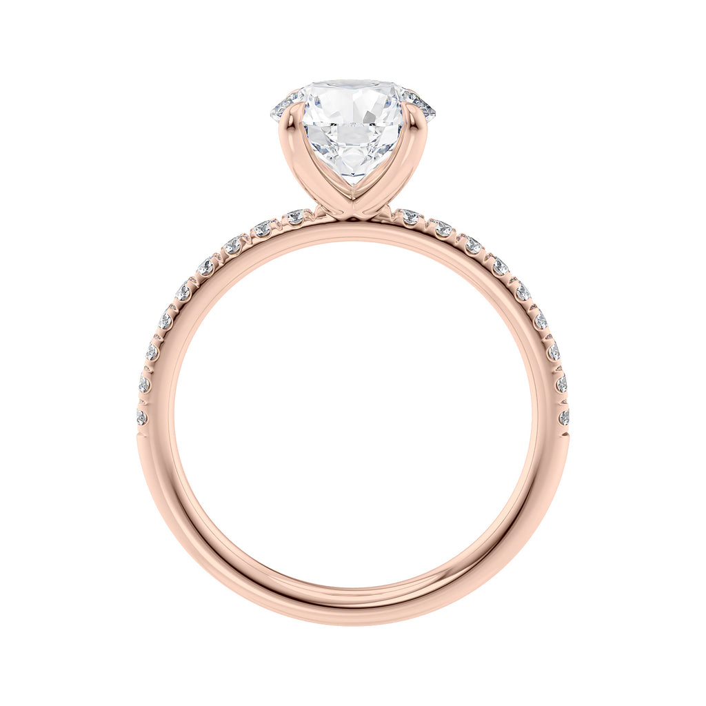 Solitaire diamond engagement ring with diamond band 18ct rose gold side view.