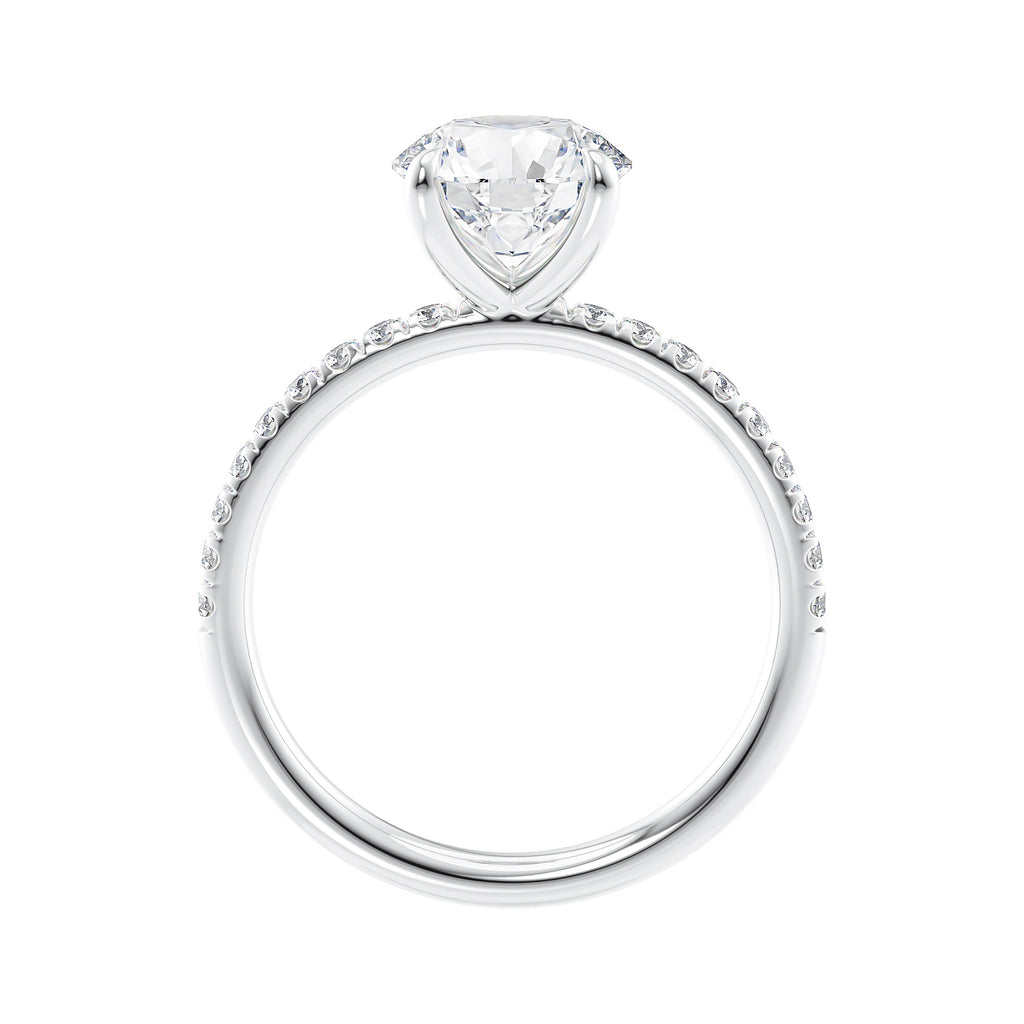 Solitaire diamond engagement ring with diamond band white gold side view.