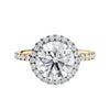Brilliant cut diamond halo style engagement ring with diamond band gold front view.