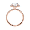 Brilliant cut diamond halo style engagement ring with diamond band rose gold side view.