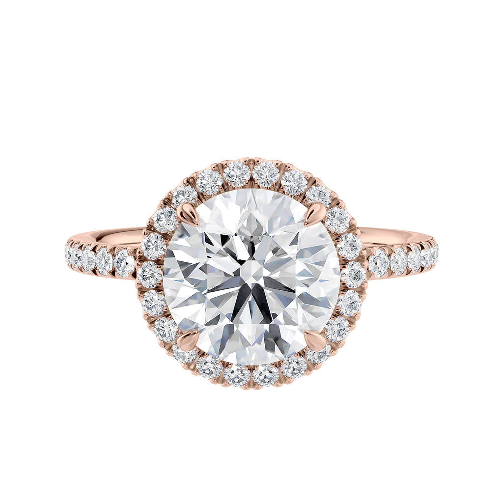 Brilliant cut diamond halo style engagement ring with diamond band rose gold front view.