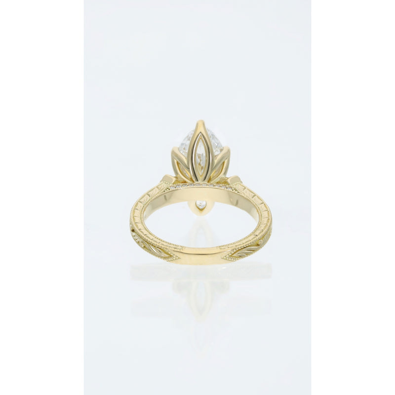 Marquise cut lab grown diamond engagement ring 2.70ct D VVS1 in carved 18ct yellow gold band end view