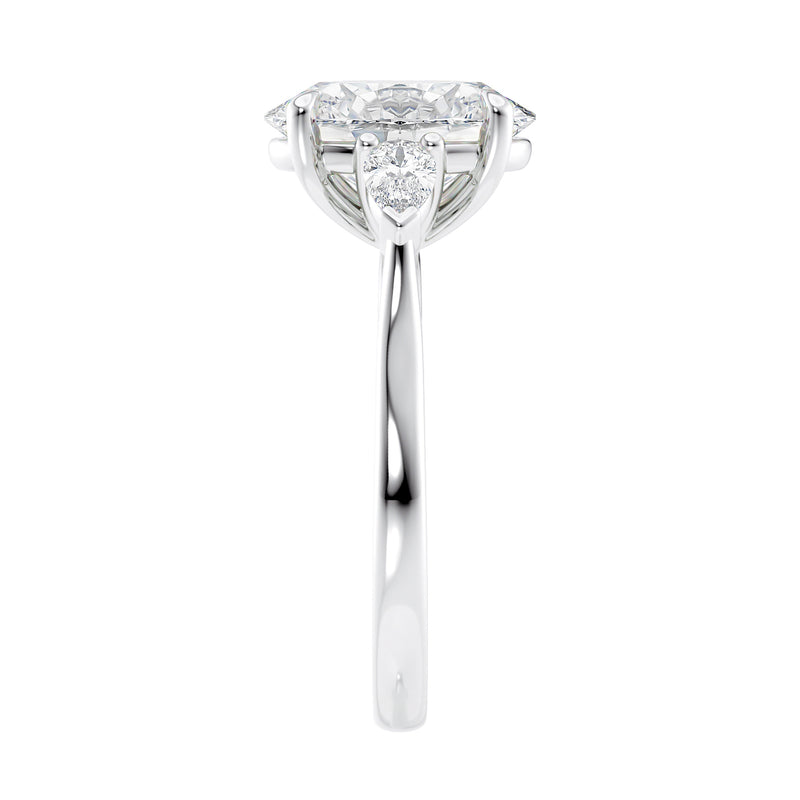 3 stone oval and pear diamond engagement ring white gold end view.