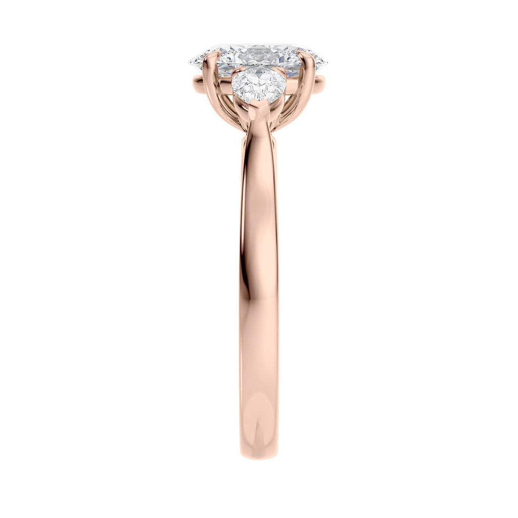 Lab grown diamond oval 3 stone with pear cut sides 18ct rose gold end view.